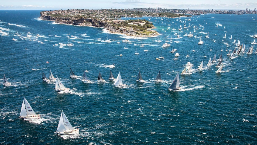 Sydney To Hobart sailing yachts leaving Sydney Harbour