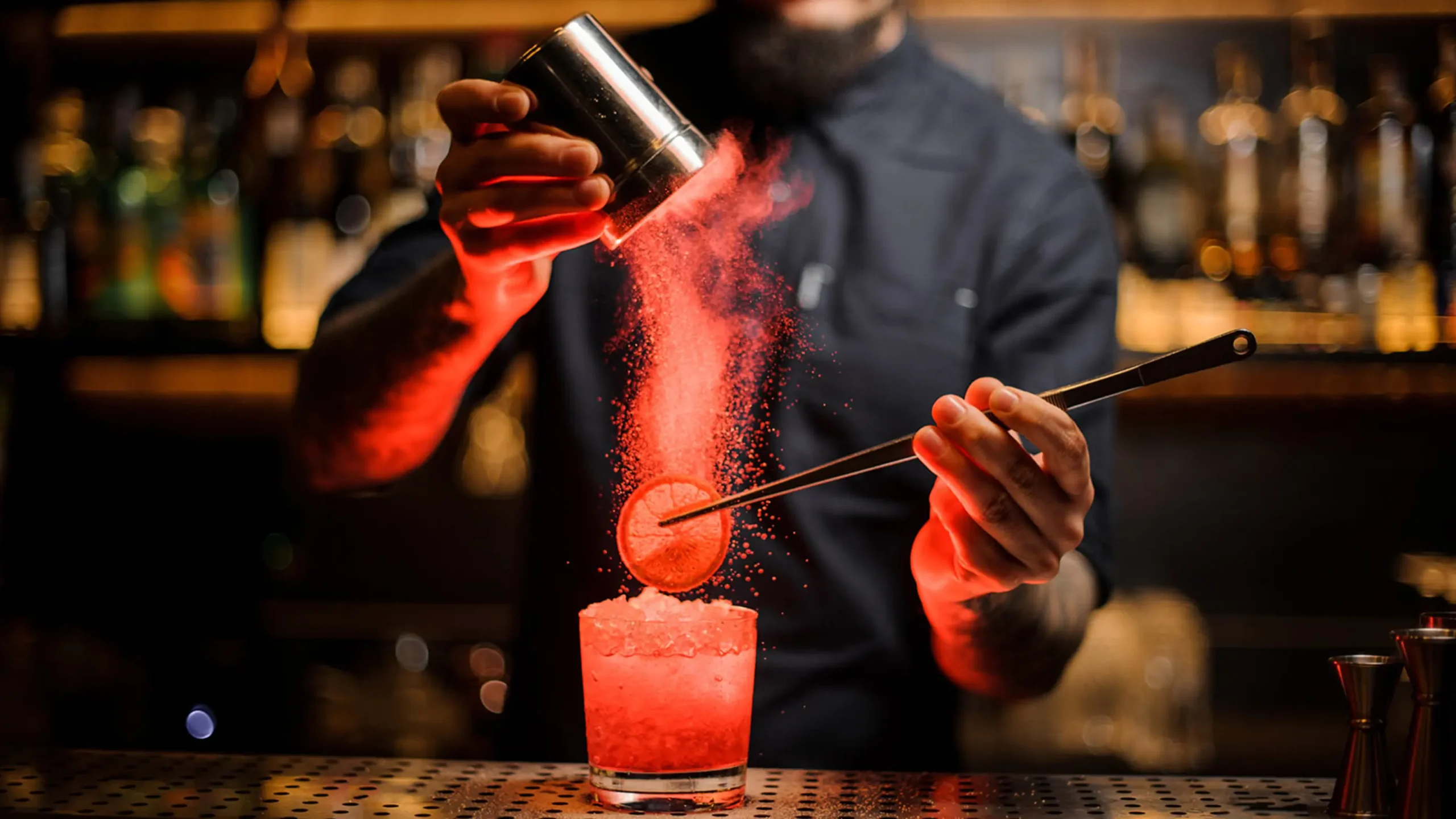 Mixologist making a cocktail on a yacht hire charter